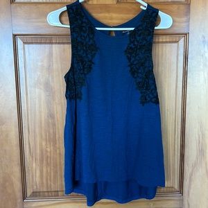 American Eagle top with black felt accent. Size small, navy blue color